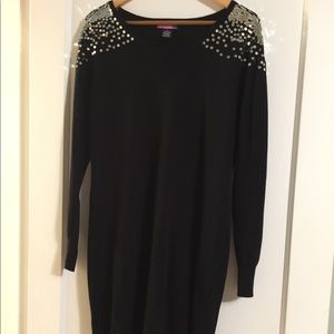 Sweater dress with sequin embellishments.